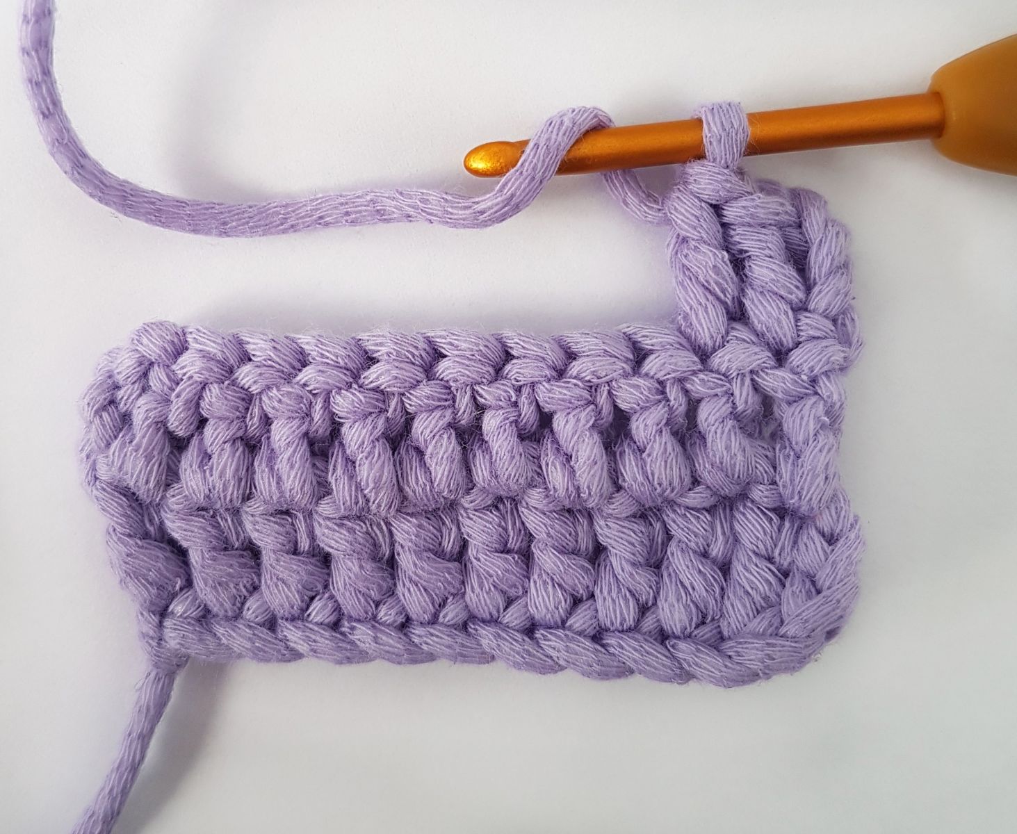 Crochet double crochet (half double crochet UK) together = Decrease with double crochet