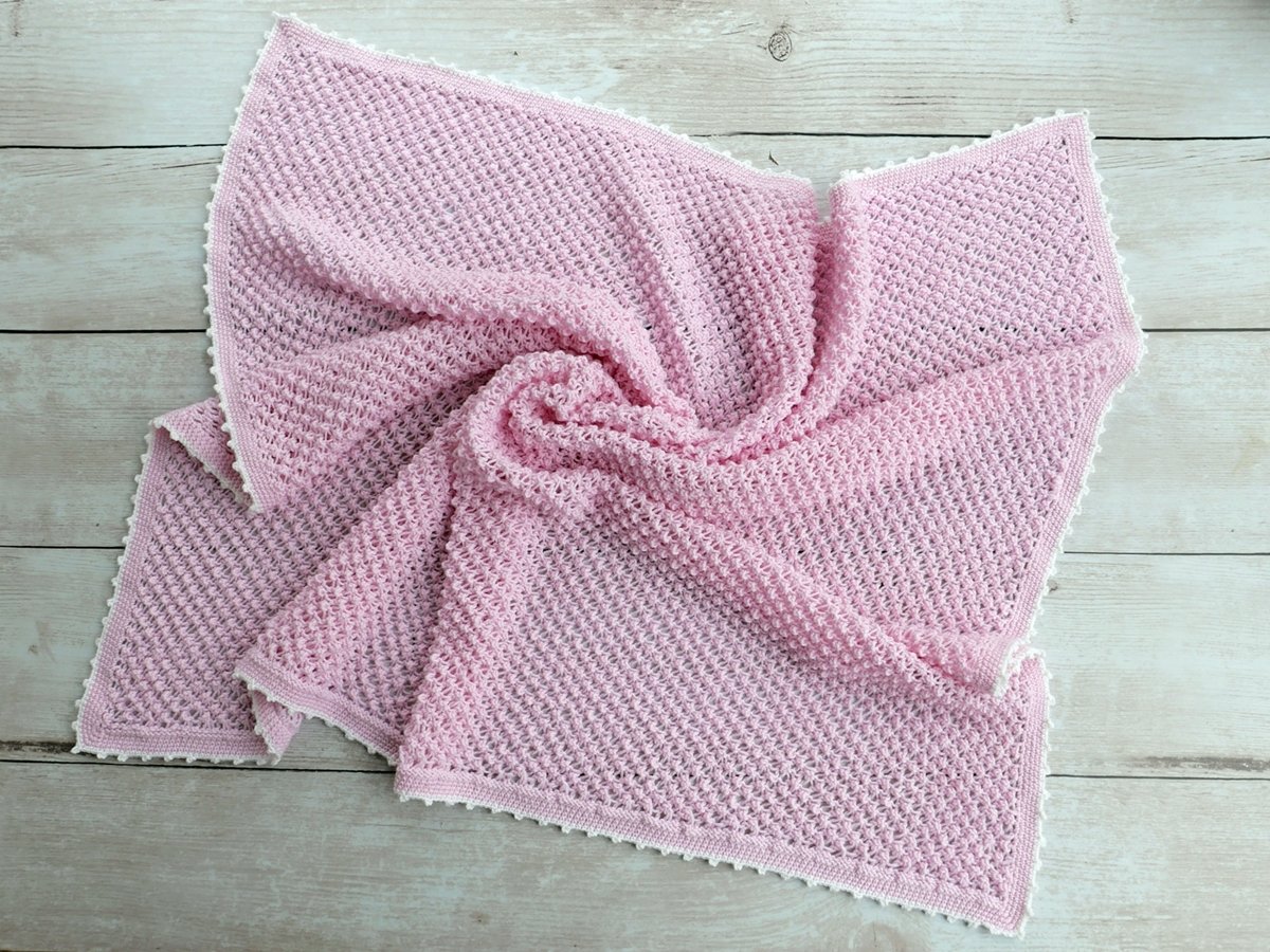 Blog-Inhaltsbild für 'Gratis Strickanleitung Decke im Röschenmuster'