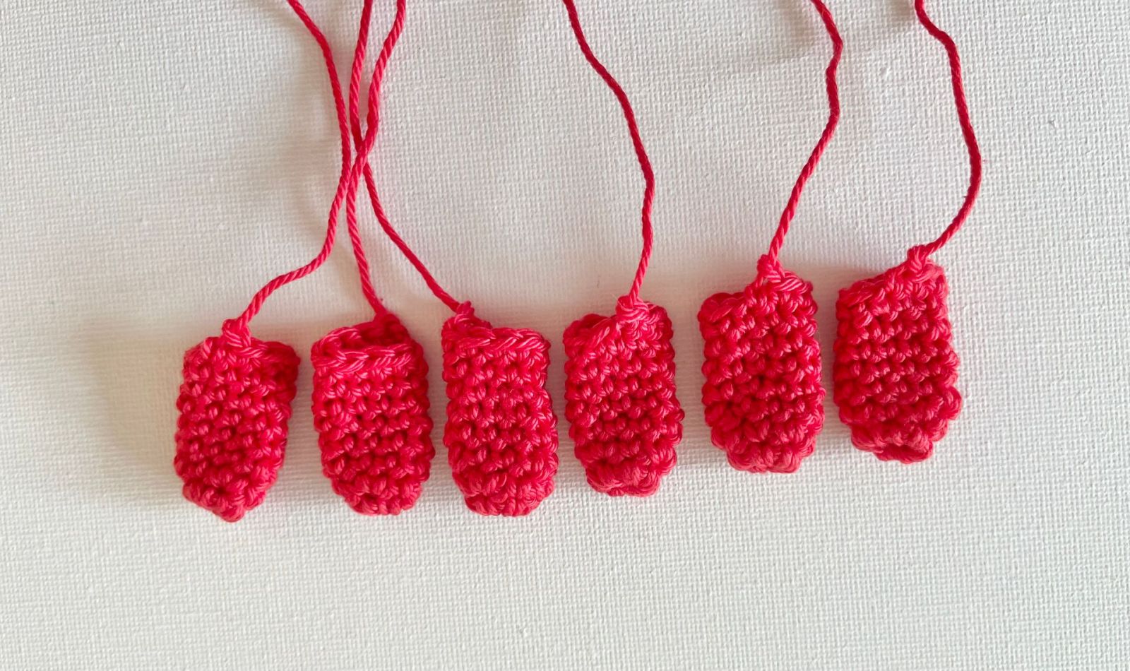 Blog-Inhaltsbild für 'Kostenlose Häkelanleitung Toilettenrollen-Überzieher Krabbe'