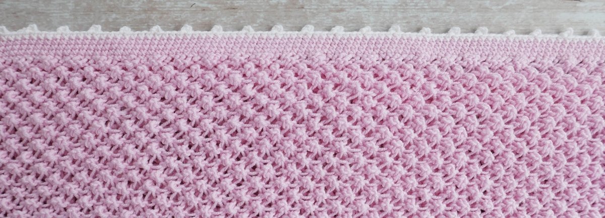 Blog-Inhaltsbild für 'Gratis Strickanleitung Decke im Röschenmuster'