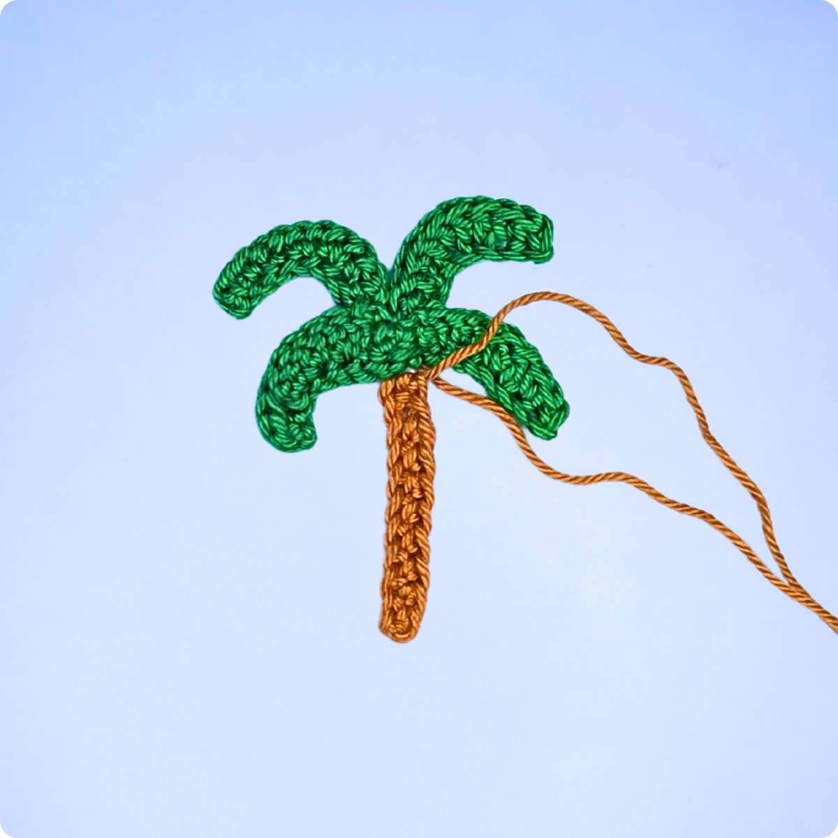 Blog-Inhaltsbild für 'Sommerliche Häkelapplikationen – Insel mit Palme, Eis am Stiel & Sonne einfach selber häkeln'