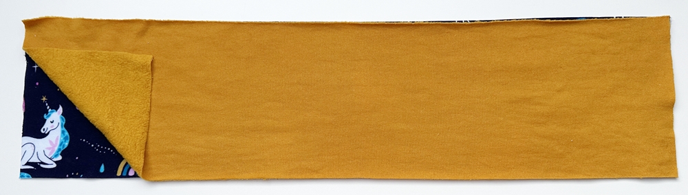 Blog-Inhaltsbild für 'Modernes Knoten-Stirnband in 2 Varianten nähen – Ratzfatz fertig'