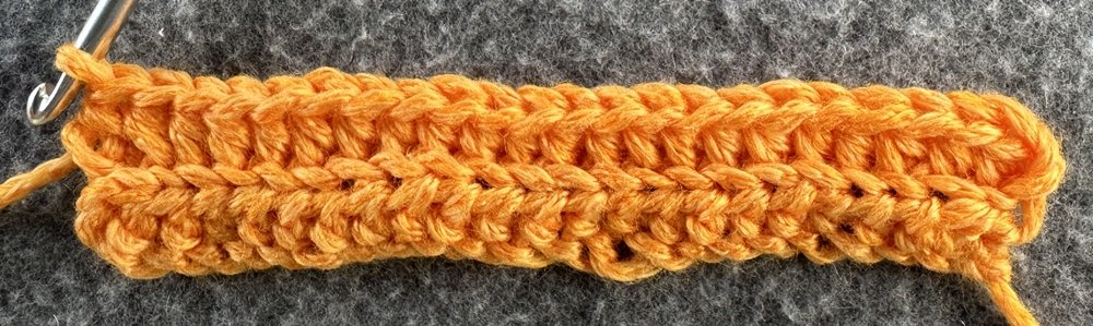 Blog-Inhaltsbild für 'Kleine Kürbisse als Schlüsselanhänger oder Taschenbaumler häkeln'