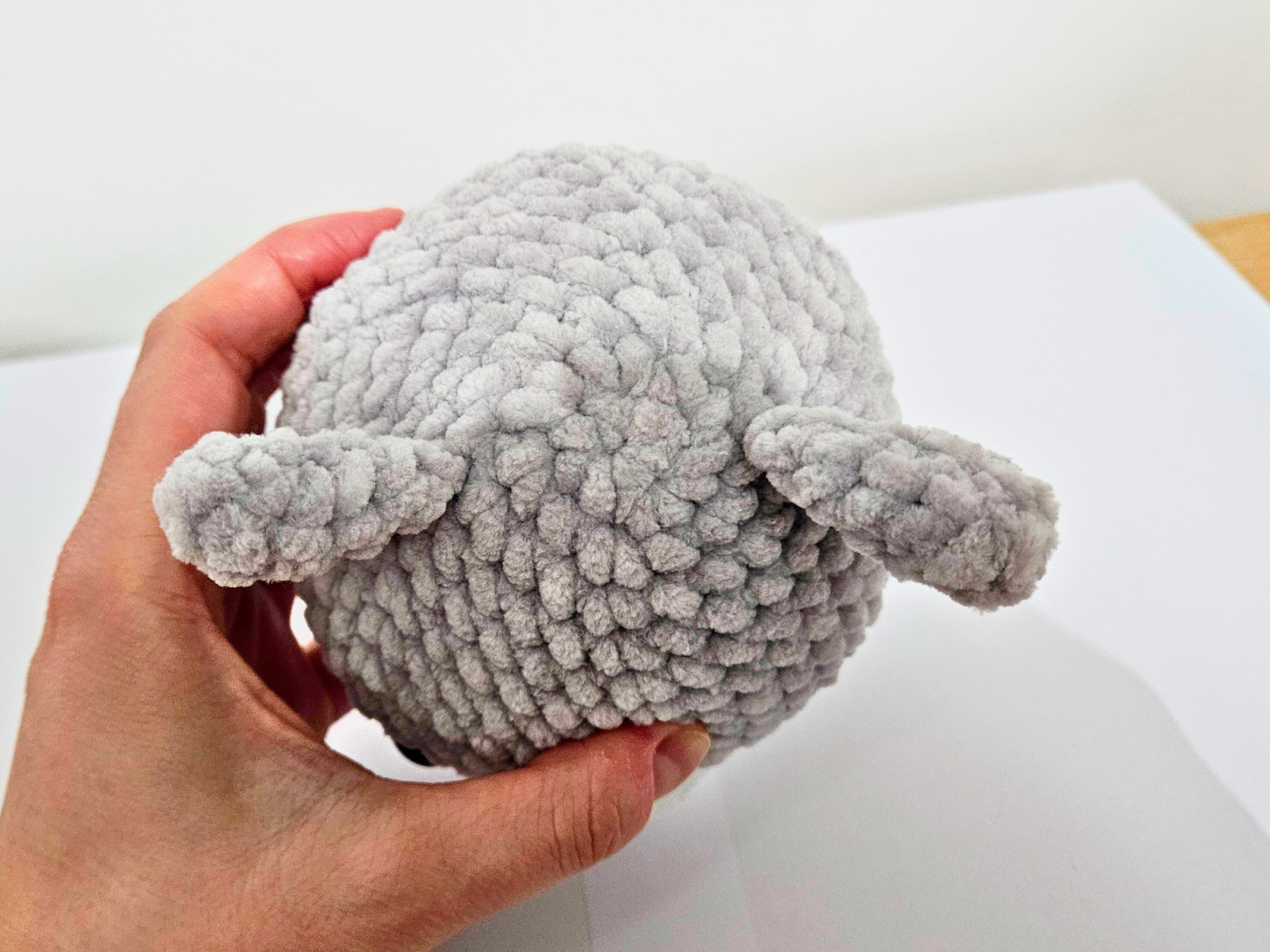 Blog content image for 'Free amigurumi crochet pattern for a small cat made with chenille yarn'