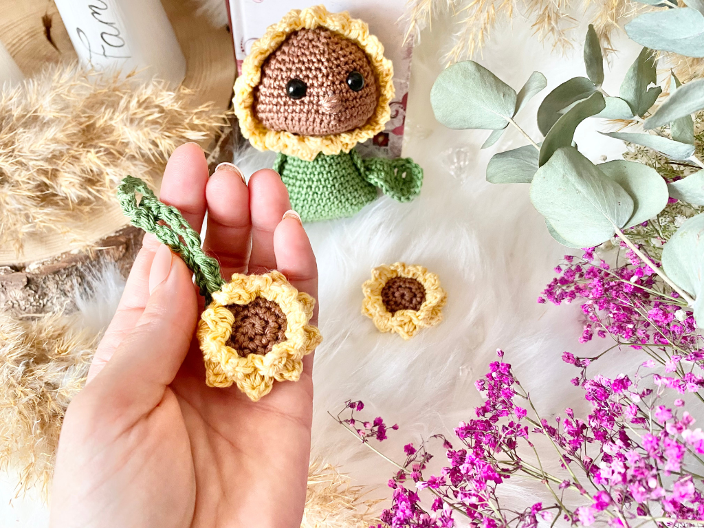 Blog-Inhaltsbild für '6. Herzensdiamanten von Wolldiamant: Die Sonnenblume fragt nicht, ob die Sonne scheint. Sie richtet sich nach ihr aus.'