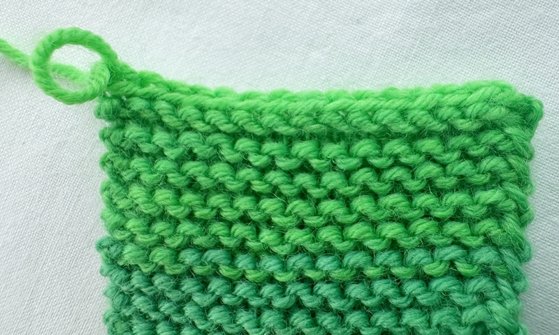 Blog-Inhaltsbild für 'Stricken mit Kindern: Kinderleichte Puppenmode für Strickanfänger'