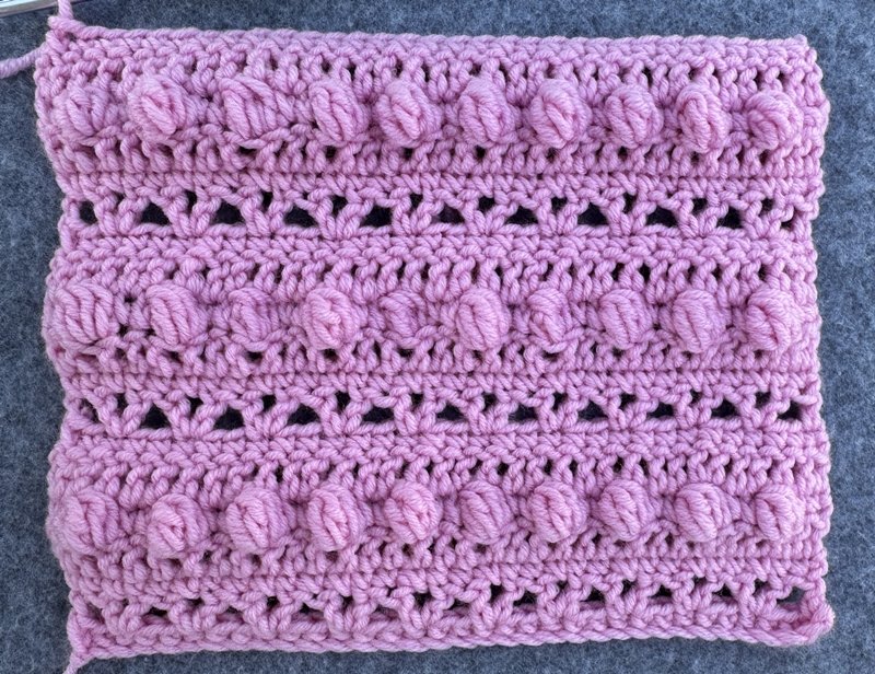 Blog-Inhaltsbild für 'Bunte Decke aus Wollresten häkeln'