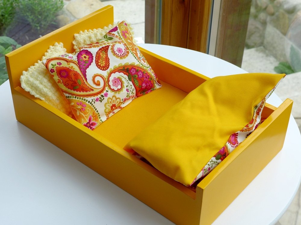 Blog-Inhaltsbild für 'Kreativ mit Holz: Wir bauen gemeinsam ein Puppenbett im Bauhausstil'