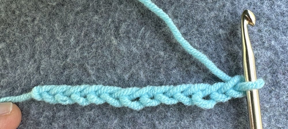 Blog-Inhaltsbild für 'Schlüsselanhänger aus Wollresten - Häkelanleitung auch für Häkelanfänger'