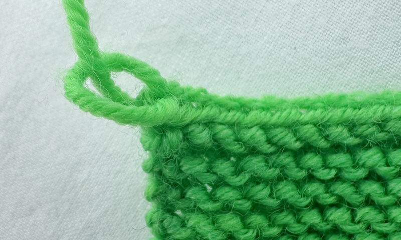 Blog-Inhaltsbild für 'Stricken mit Kindern: Kinderleichte Puppenmode für Strickanfänger'