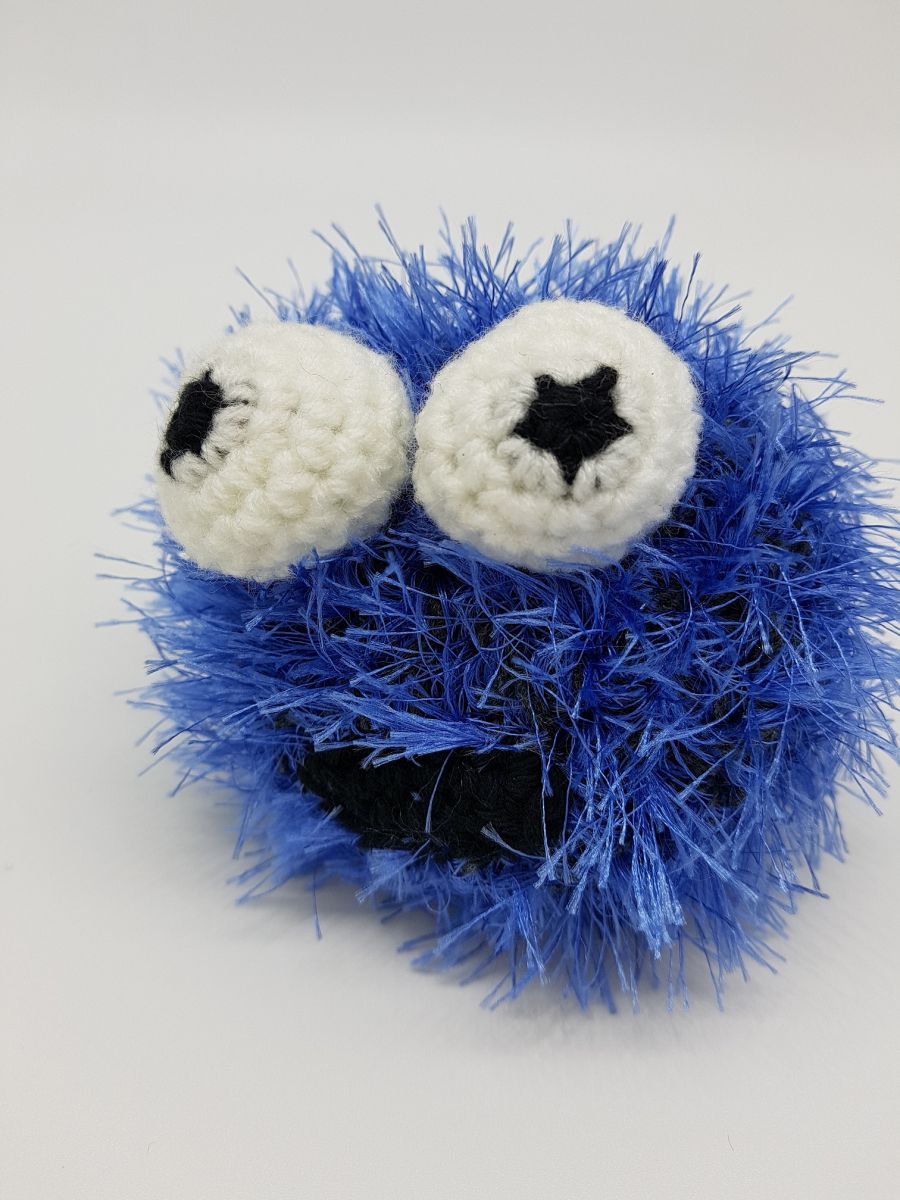 Blog-Inhaltsbild für 'Kostenlose Häkelanleitung für das kleine Wuschelmonster'