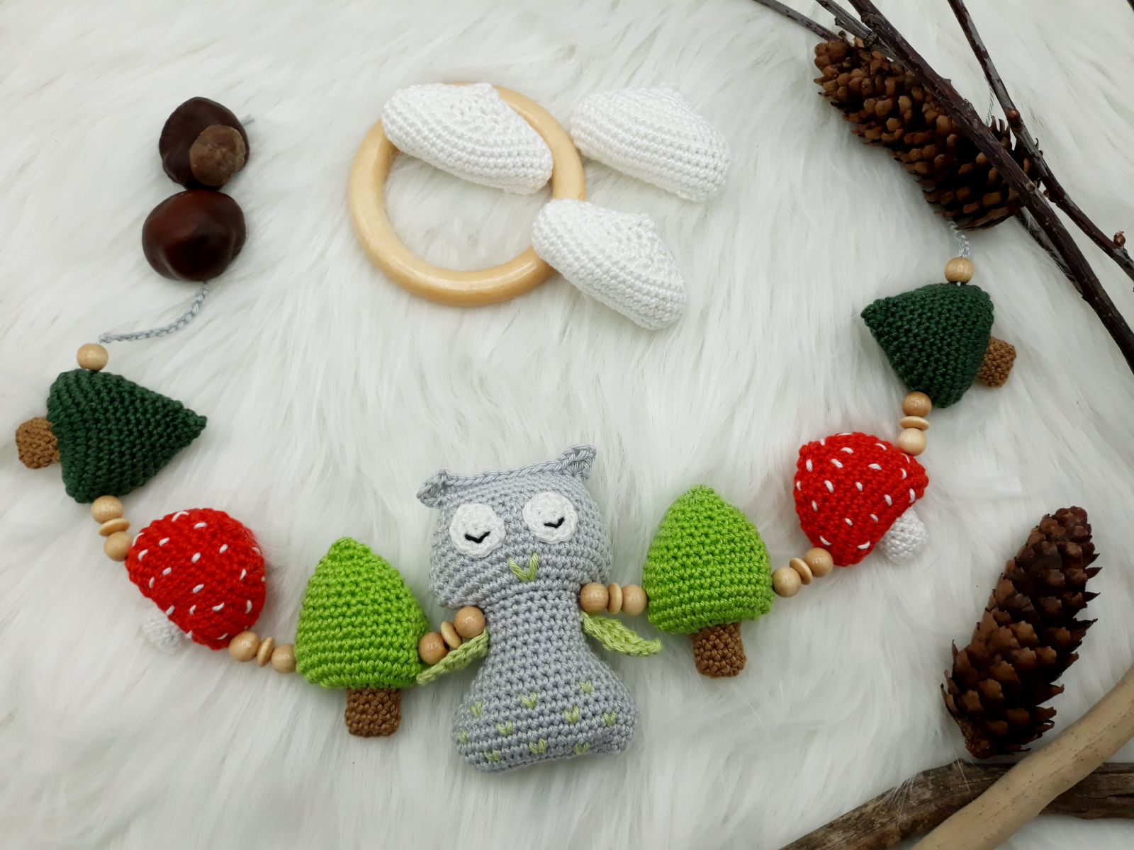 Blog-Inhaltsbild für 'Eulenkinderwagenkette, kostenlose Häkelanleitung von Wolldiamant'