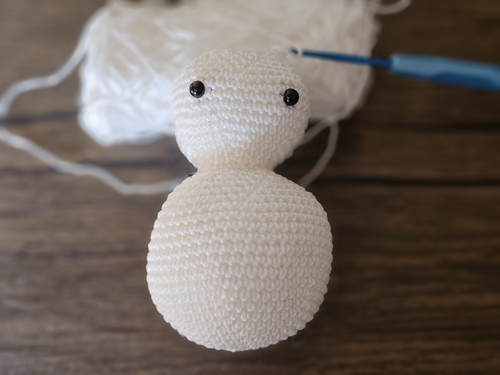 Blog-Inhaltsbild für 'Kostenlose Häkelanleitung für einen Schneemann'