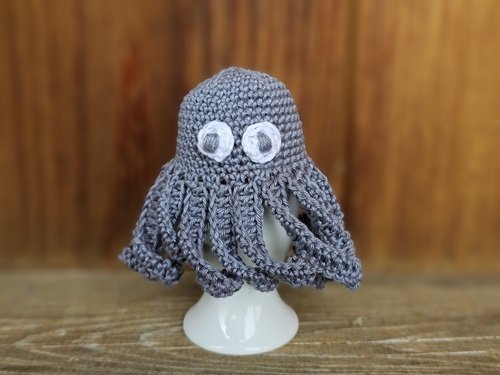 Blog-Inhaltsbild für 'Kostenlose Häkelanleitung für einen Kraken Eierwärmer'