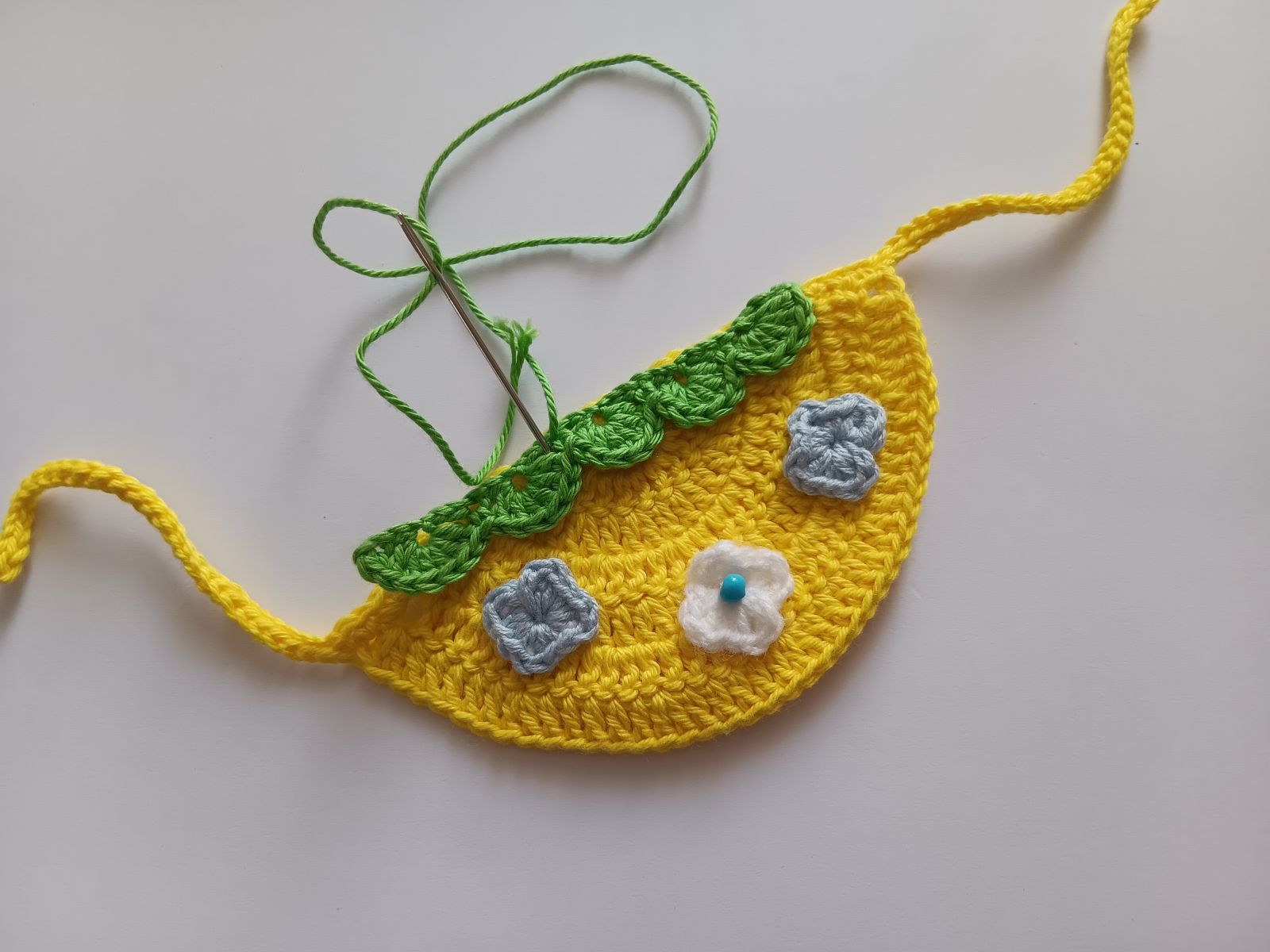 Blog-Inhaltsbild für 'So häkelst du eine Tasche: Kostenlose Anleitung für Erdbeertasche'