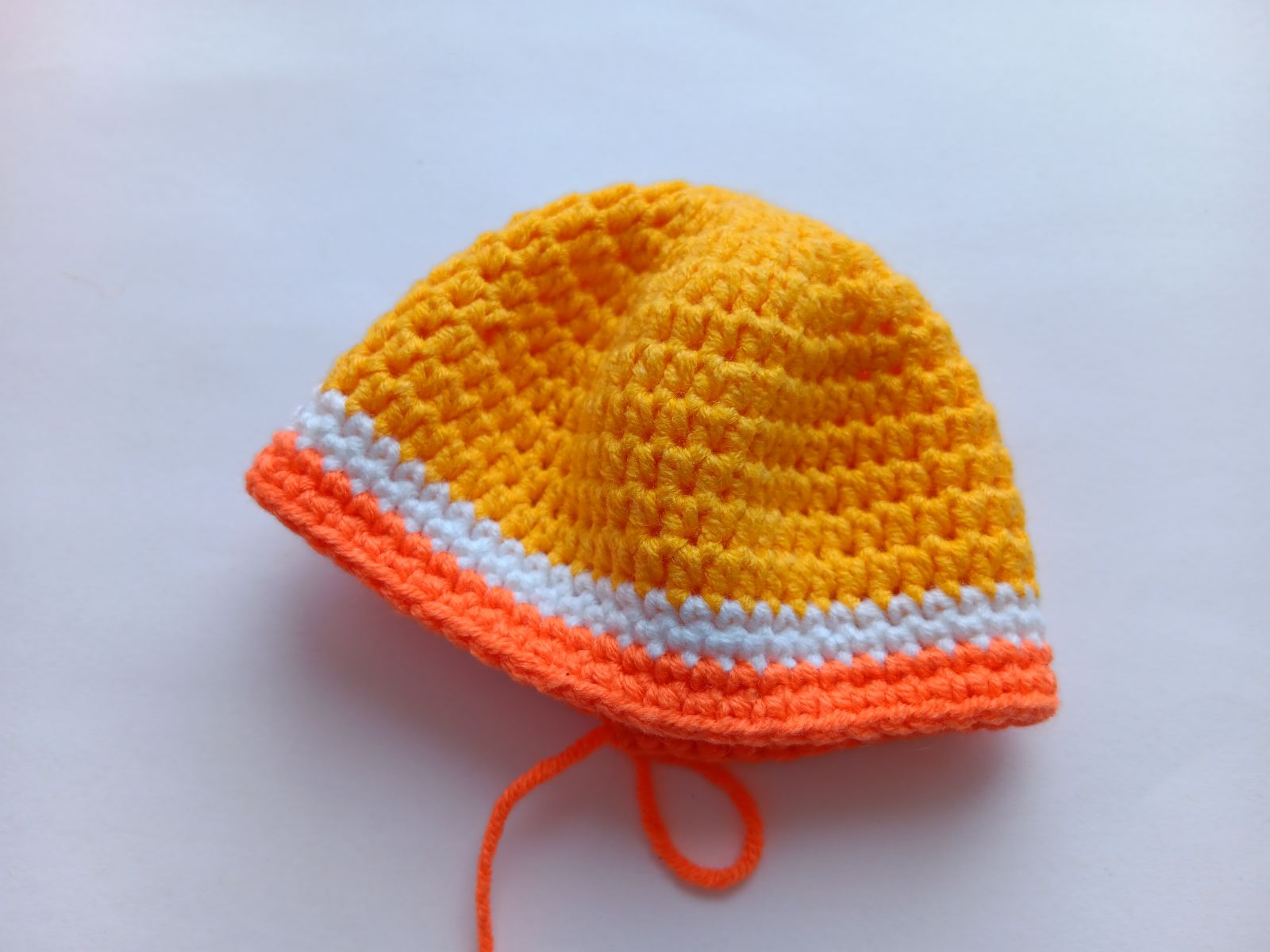 Blog-Inhaltsbild für 'Kostenlose Häkelanleitung für Puppe Orange'