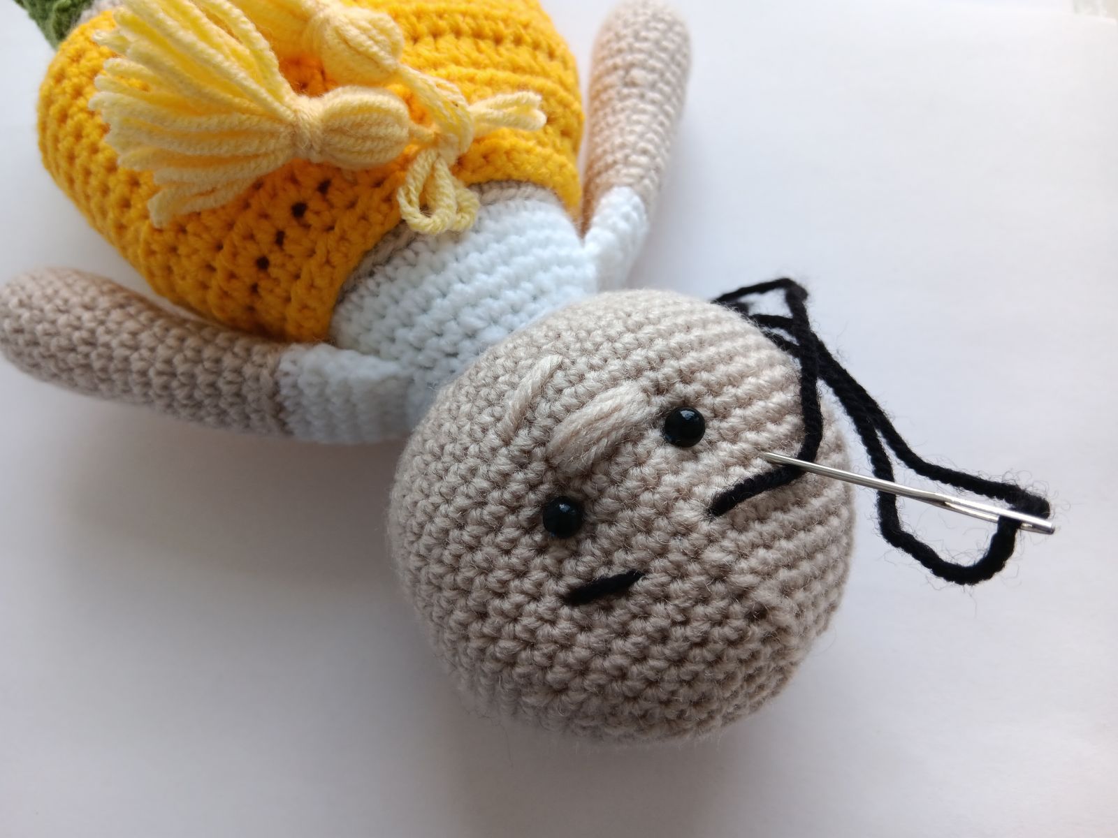 Blog-Inhaltsbild für 'Kostenlose Häkelanleitung für Puppe Orange'