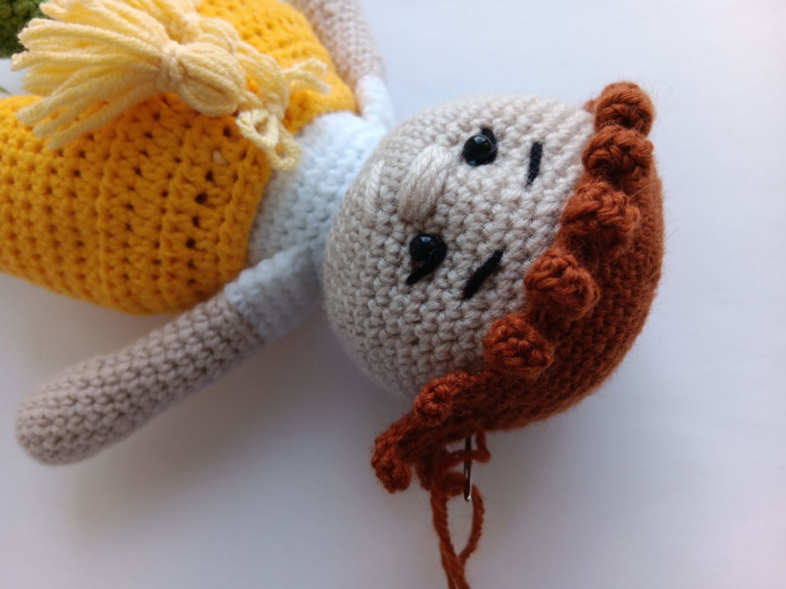 Blog-Inhaltsbild für 'Kostenlose Häkelanleitung für Puppe Orange'