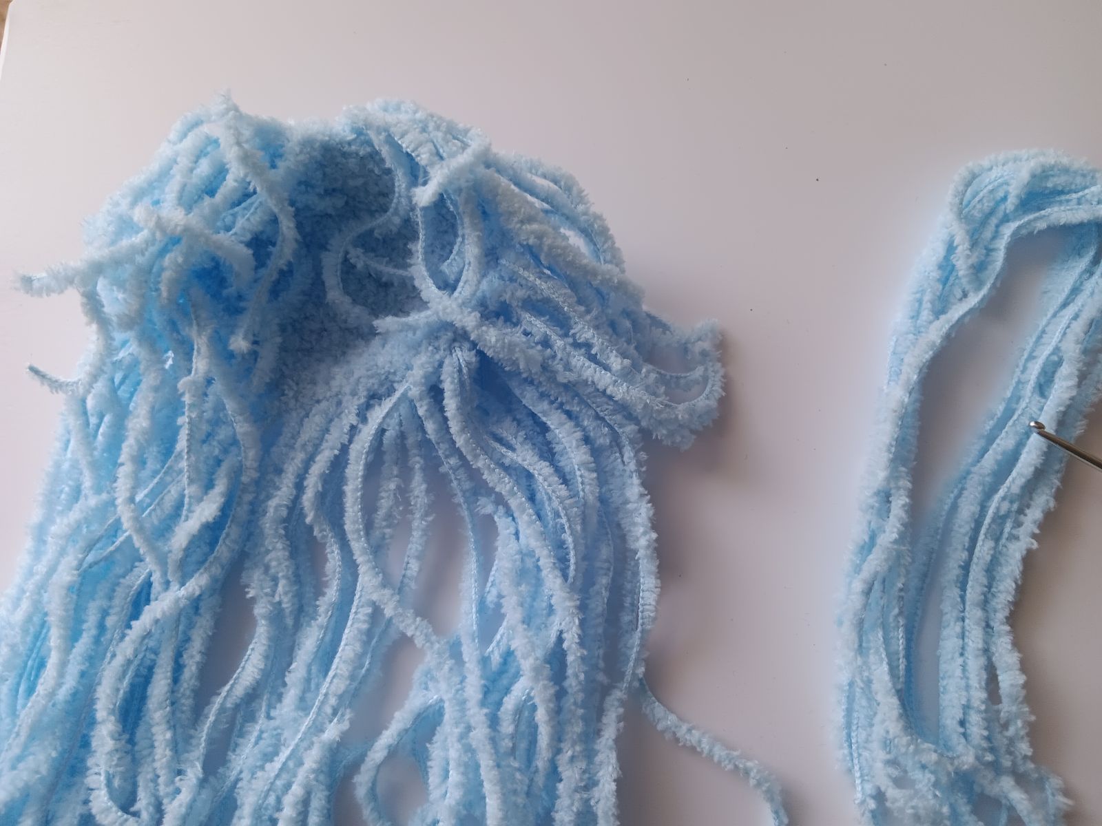 Blog-Inhaltsbild für 'Kostenlose Häkelanleitung für Puppe Coney mit Hasenmütze'