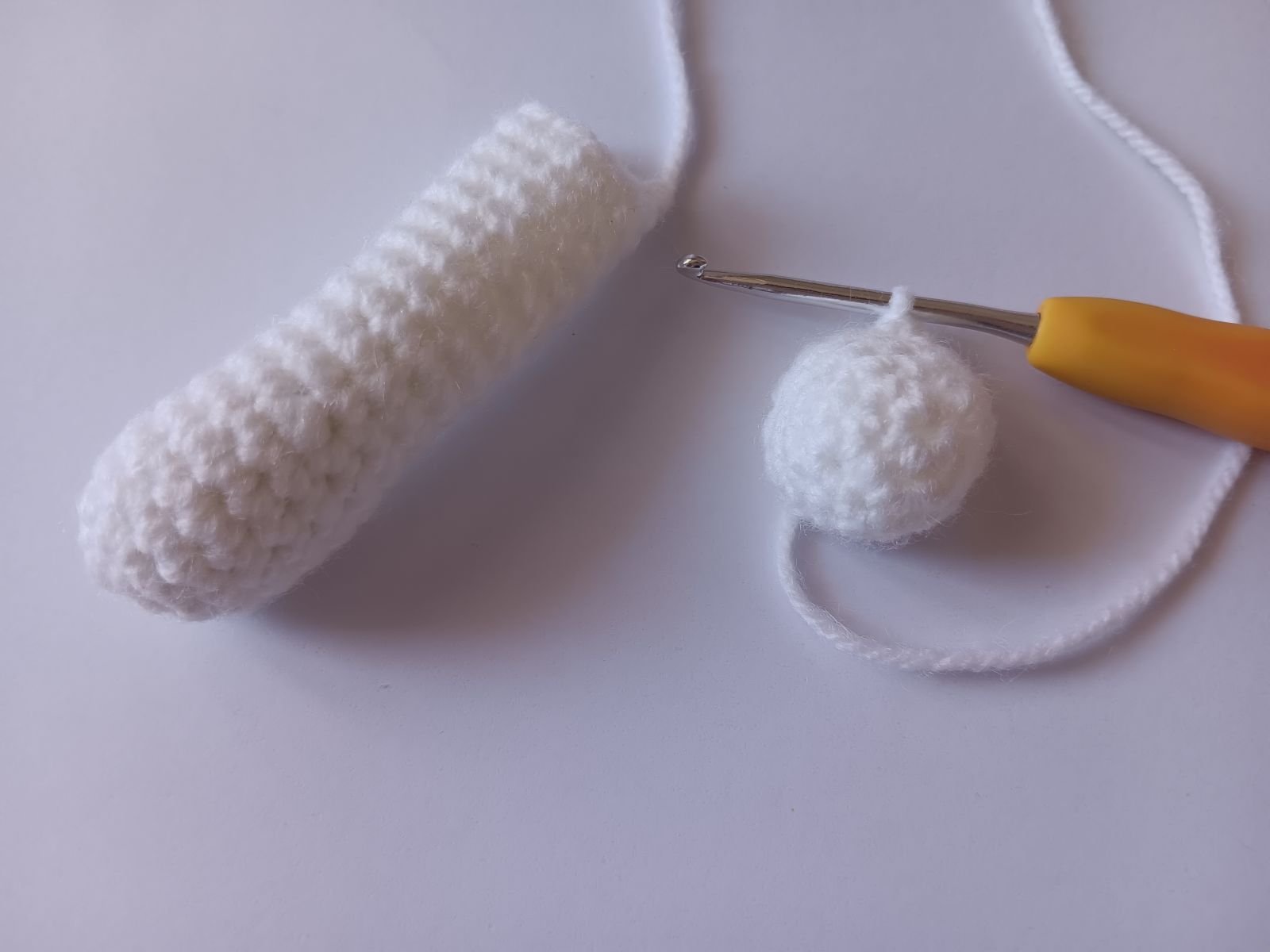 Blog-Inhaltsbild für 'Kostenlose Häkelanleitung für Puppe Coney mit Hasenmütze'