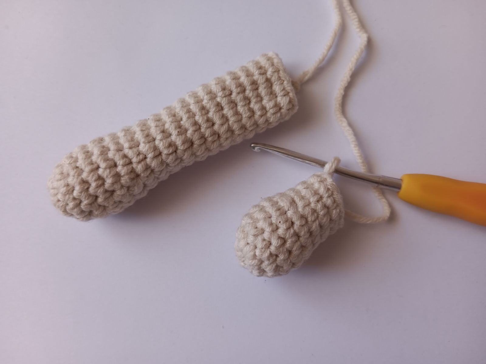 Blog-Inhaltsbild für 'Kostenlose Häkelanleitung für Puppe Orange'