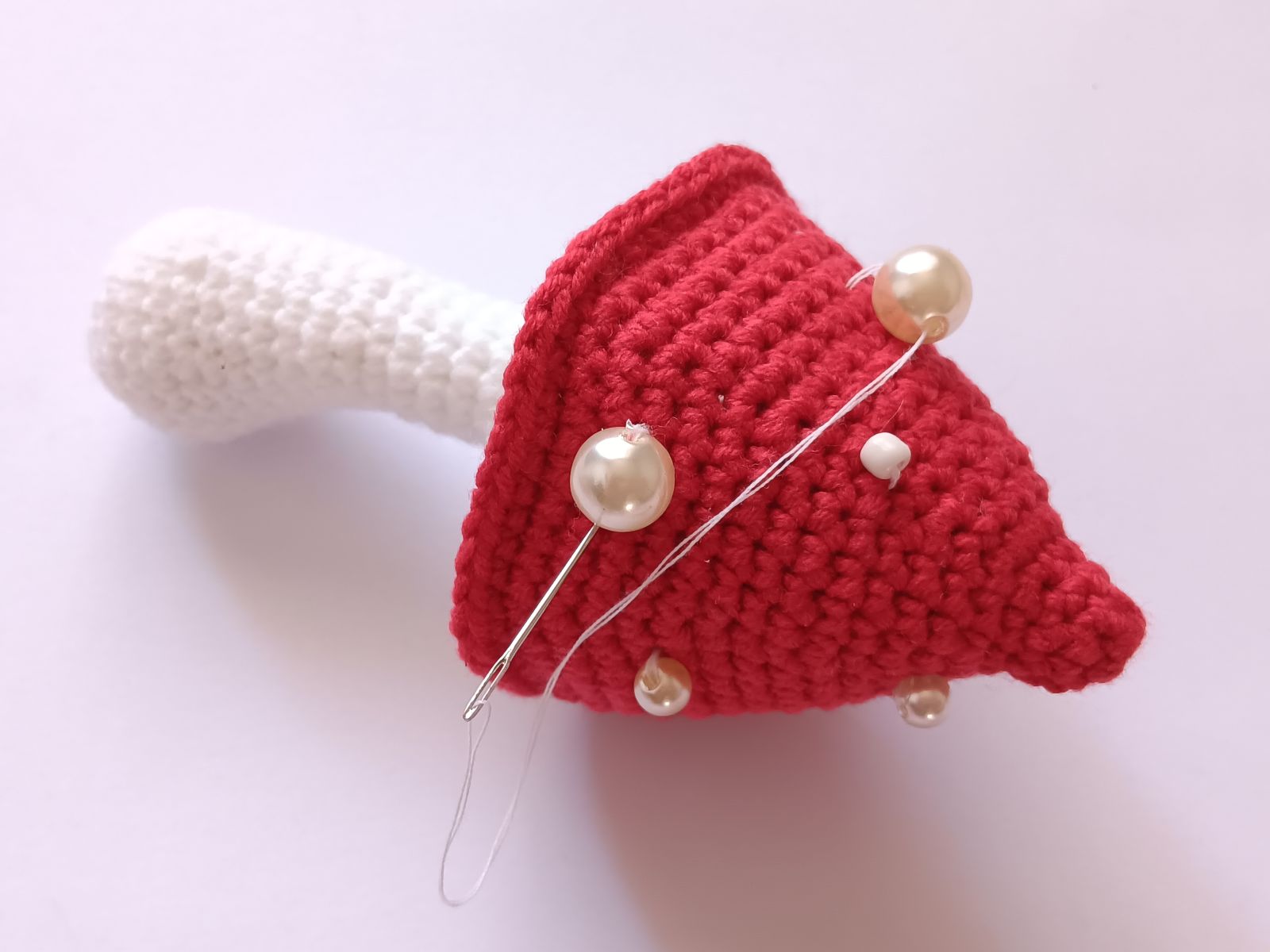 Blog-Inhaltsbild für 'Kostenlose Häkelanleitung für Puppe Coney mit Hasenmütze'