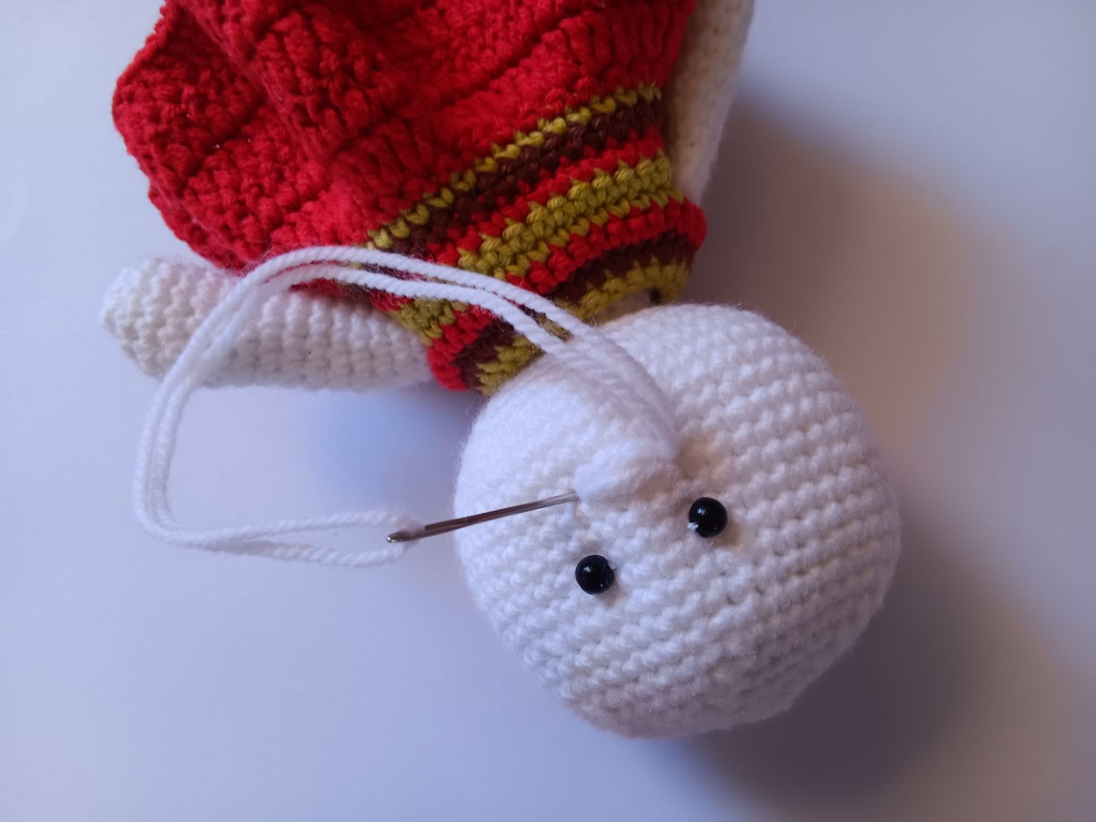 Blog-Inhaltsbild für 'Kostenlose Häkelanleitung für Puppe Coney mit Hasenmütze'