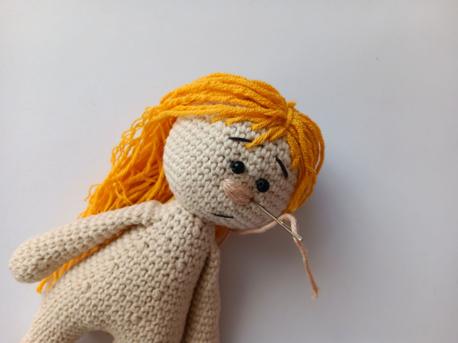 Blog-Inhaltsbild für 'Kostenlose Häkelanleitung für Puppe Orange'