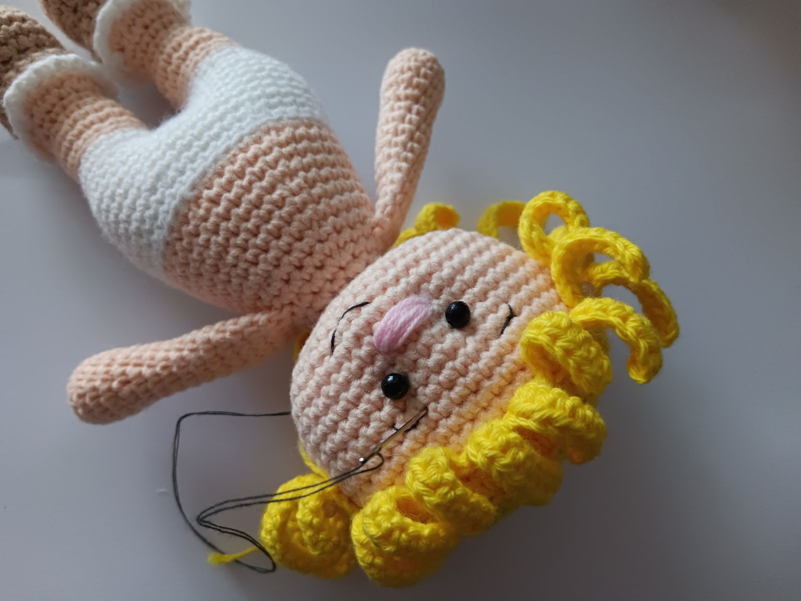 Blog-Inhaltsbild für 'Kostenlose Häkelanleitung für Puppe Orange'