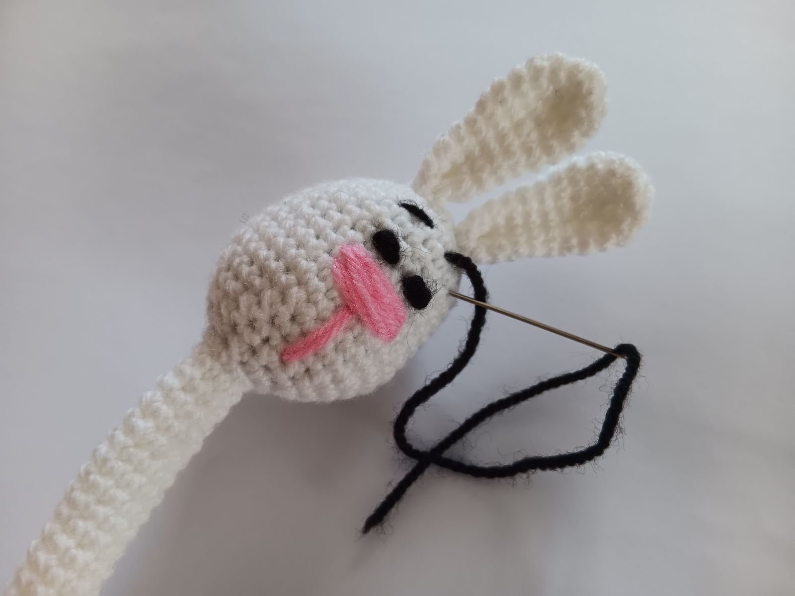 Blog-Inhaltsbild für 'Handytasche Häschen häkeln. Kostenlose Häkelanleitung'