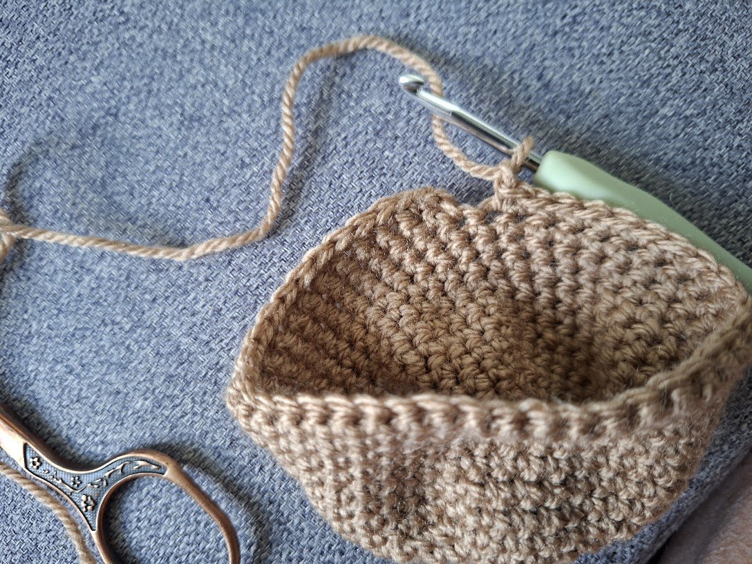 Blog-Inhaltsbild für 'Kostenlose Häkelanleitung für ein süßes Schmusepüppchen'