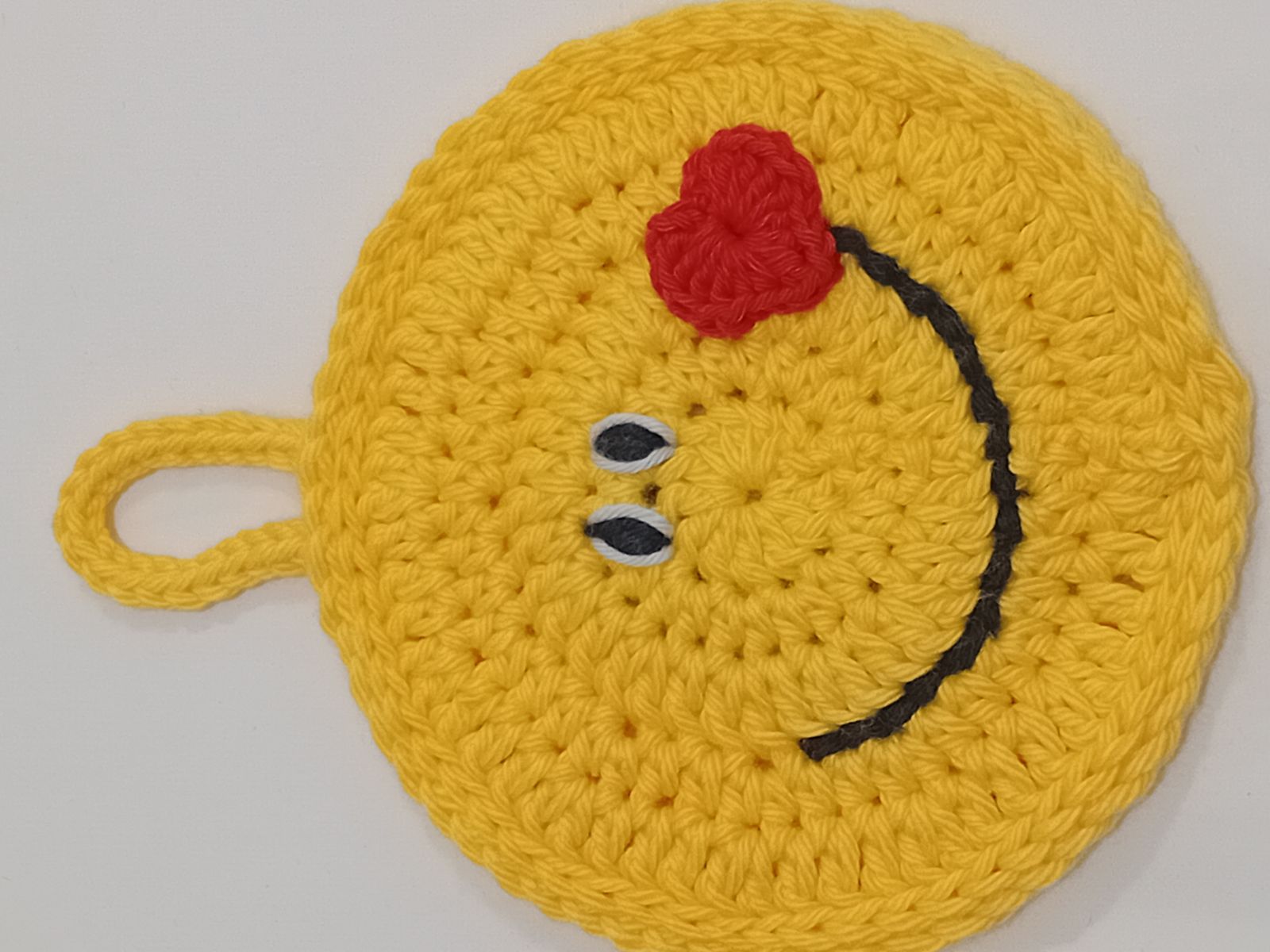 Blog-Inhaltsbild für 'Smiley häkeln: Happy or Sad? Kostenlose Anleitung für ein Emotion Türschild'