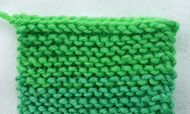 Blog-Inhaltsbild für 'Stricken mit Kindern: Kinderleichte Puppenmode für Strickanfänger'