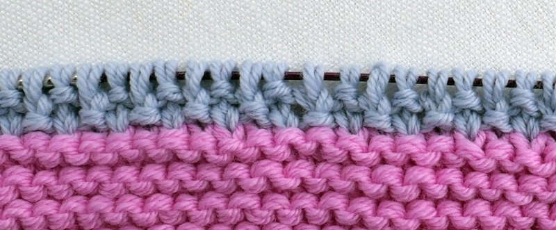 Blog-Inhaltsbild für 'Die weichste Babydecke der Welt im Mustermix - Kostenlose Strickanleitung'