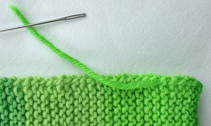 Blog-Inhaltsbild für 'Stricken mit Kindern: Kinderleichte Puppenmode für Strickanfänger'