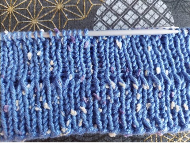 Blog-Inhaltsbild für 'Kostenlose Strickanleitung – Partnerlook-Mützen für Vater und Sohn'