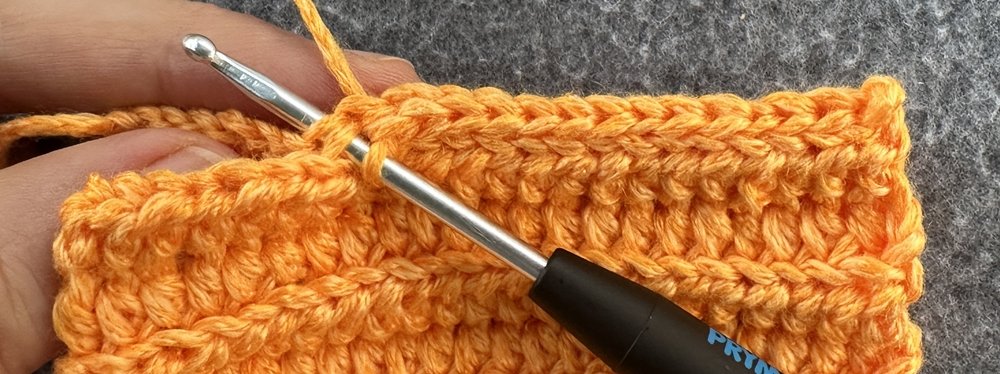 Blog-Inhaltsbild für 'Kleine Kürbisse als Schlüsselanhänger oder Taschenbaumler häkeln'