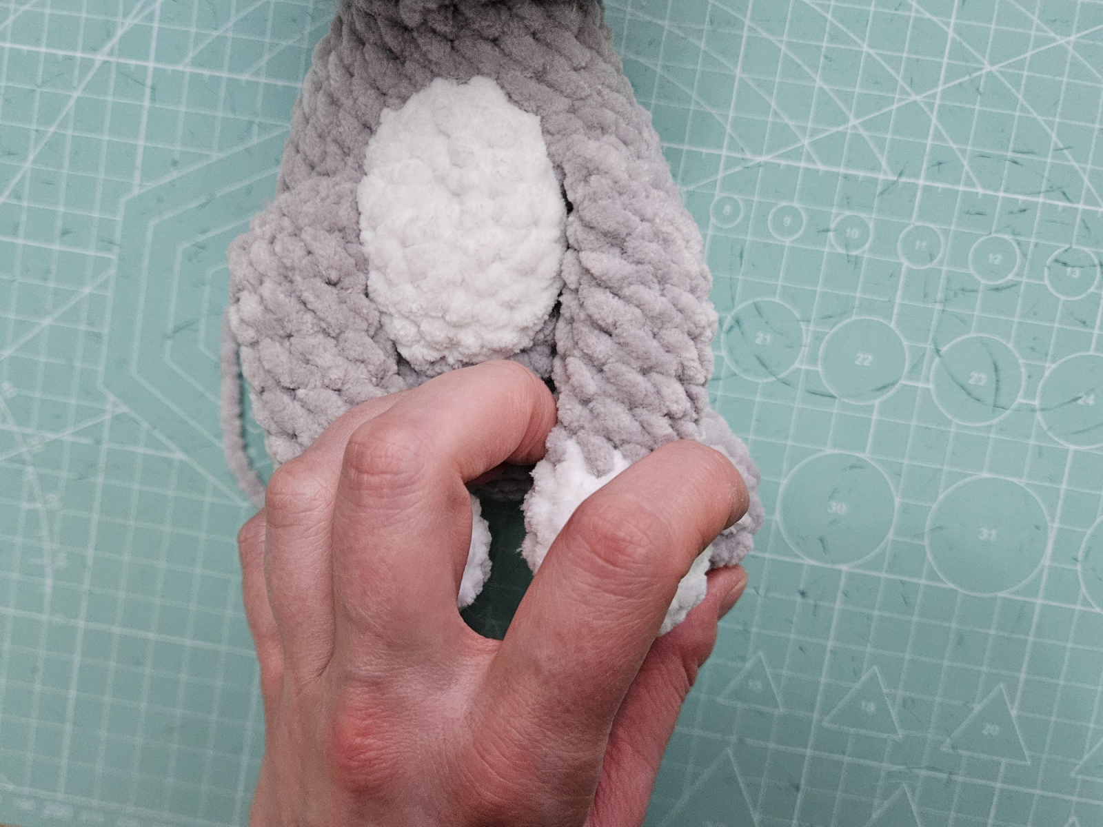 Blog content image for 'Free amigurumi crochet pattern for a small cat made with chenille yarn'