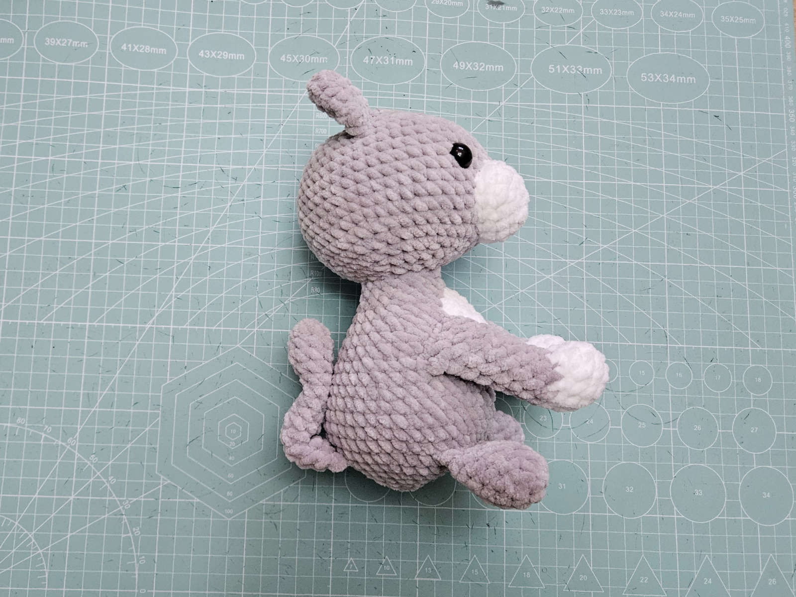 Blog content image for 'Free amigurumi crochet pattern for a small cat made with chenille yarn'
