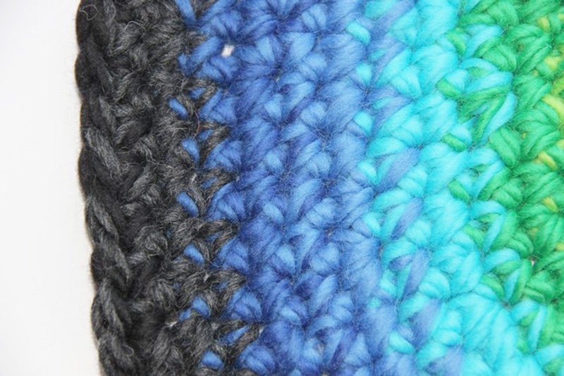 Blog-Inhaltsbild für 'Gefilztes rundes Sitzkissen aus Wollresten'