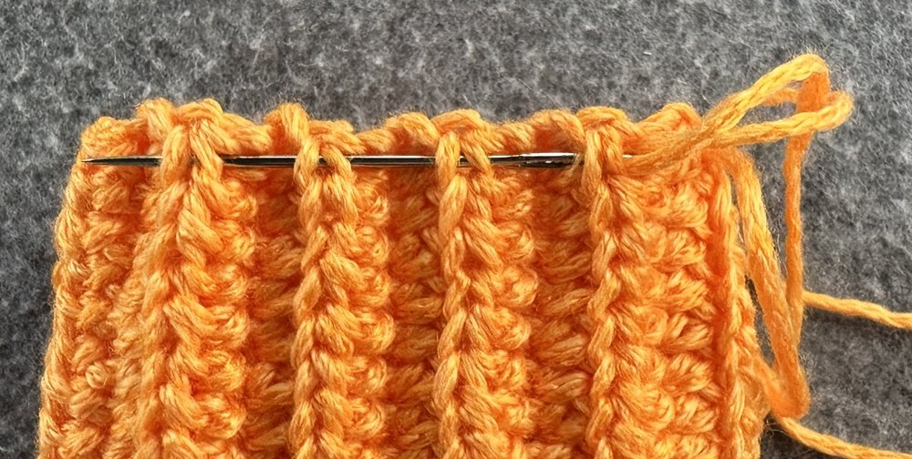 Blog-Inhaltsbild für 'Kleine Kürbisse als Schlüsselanhänger oder Taschenbaumler häkeln'