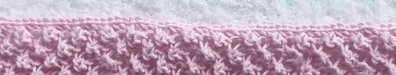 Blog-Inhaltsbild für 'Gratis Strickanleitung Decke im Röschenmuster'