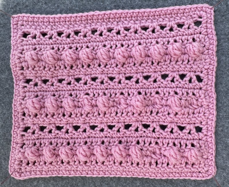 Blog-Inhaltsbild für 'Bunte Decke aus Wollresten häkeln'