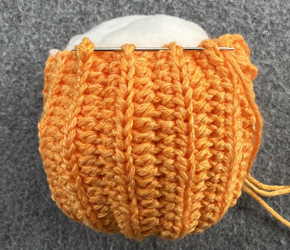 Blog-Inhaltsbild für 'Kleine Kürbisse als Schlüsselanhänger oder Taschenbaumler häkeln'