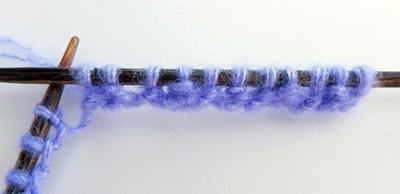 Blog-Inhaltsbild für 'Kostenlose Strickanleitung - Pulswärmer Deluxe'