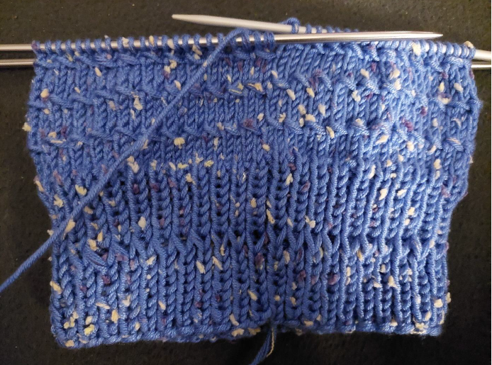 Blog-Inhaltsbild für 'Kostenlose Strickanleitung – Partnerlook-Mützen für Vater und Sohn'