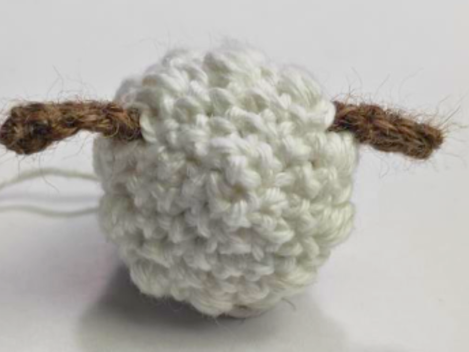 Blog-Inhaltsbild für 'Kostenlose Häkelanleitung Eierbecher Schäfchen für Ostern'