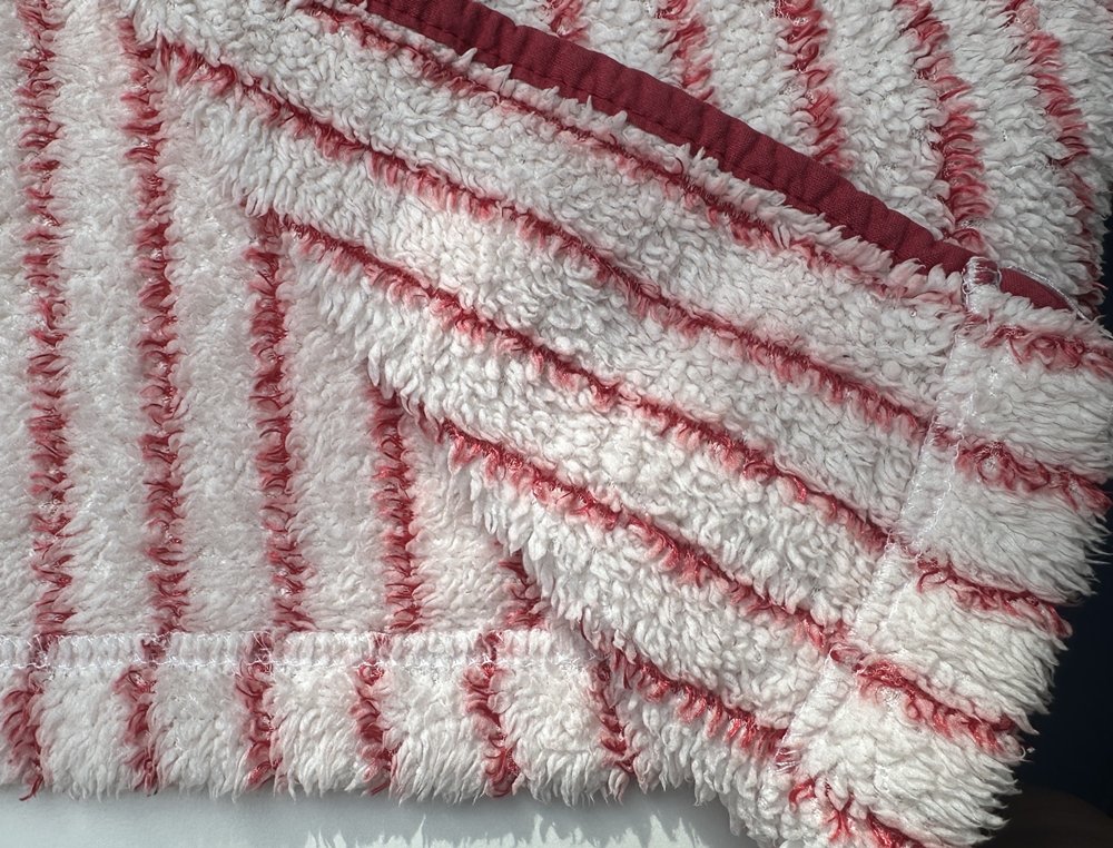 Blog-Inhaltsbild für 'Aus Alt mach Neu: Waschhandschuhe aus altem Bademantel nähen'