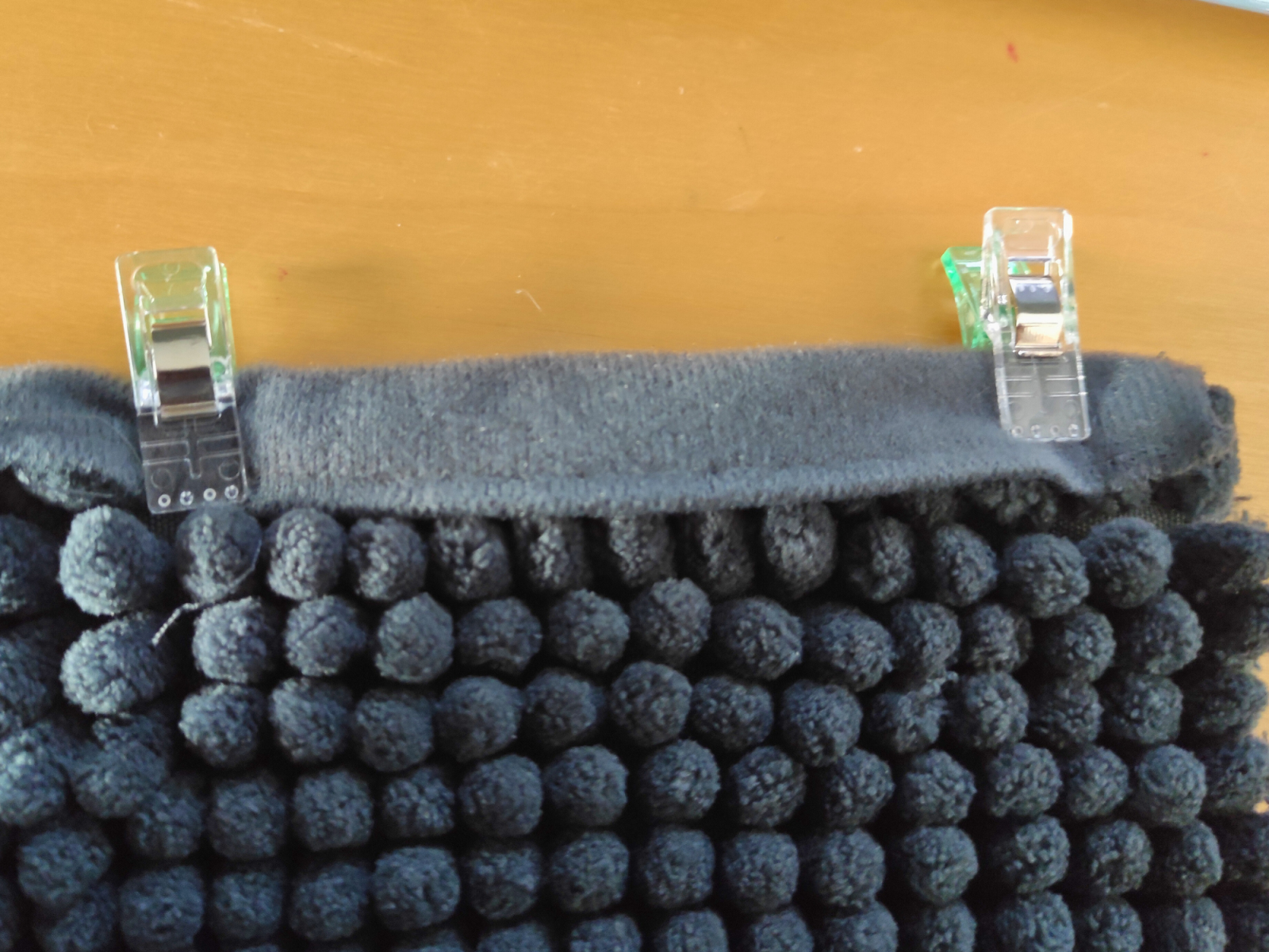 Blog content image for 'DIY: Turn a Regular Bath Mat into a V-Shaped Rug for Your Corner Shower'