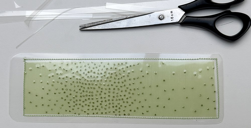 Blog-Inhaltsbild für 'DIY: Laminierte Lesezeichen mit Kindern basteln'